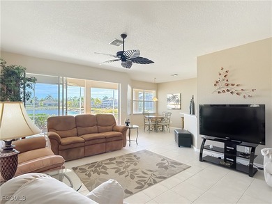 This beautifully maintained LAKEFRONT Sandpiper model home in on Herons Glen Golf and Country Club in Florida - for sale on GolfHomes.com, golf home, golf lot