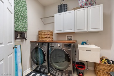 This beautifully maintained 3-bedroom, 3-bath ranch backs on Oak Shadows Golf Club in Ohio - for sale on GolfHomes.com, golf home, golf lot