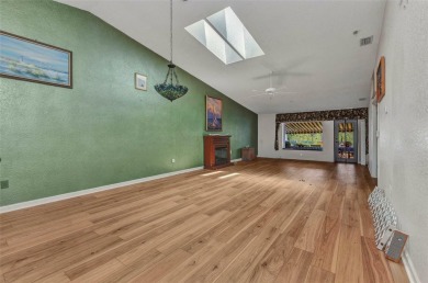 This stunning three-bedroom, two-bath freestanding villa is on Twin Isles Country Club in Florida - for sale on GolfHomes.com, golf home, golf lot