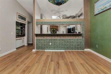 This stunning three-bedroom, two-bath freestanding villa is on Twin Isles Country Club in Florida - for sale on GolfHomes.com, golf home, golf lot