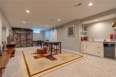 This beautifully maintained 3-bedroom, 3-bath ranch backs on Oak Shadows Golf Club in Ohio - for sale on GolfHomes.com, golf home, golf lot