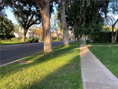 Discover one of the best-gated residences in Los Angeles! on Virginia Country Club in California - for sale on GolfHomes.com, golf home, golf lot