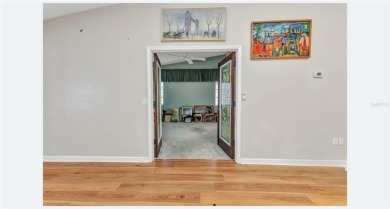 This stunning three-bedroom, two-bath freestanding villa is on Twin Isles Country Club in Florida - for sale on GolfHomes.com, golf home, golf lot