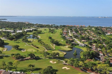 Enjoy elevated, front-row sunset views from this top-floor on IMG Academies Golf and Country Club in Florida - for sale on GolfHomes.com, golf home, golf lot
