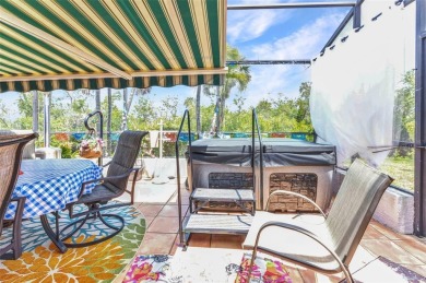 This stunning three-bedroom, two-bath freestanding villa is on Twin Isles Country Club in Florida - for sale on GolfHomes.com, golf home, golf lot