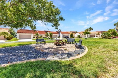 This stunning three-bedroom, two-bath freestanding villa is on Twin Isles Country Club in Florida - for sale on GolfHomes.com, golf home, golf lot