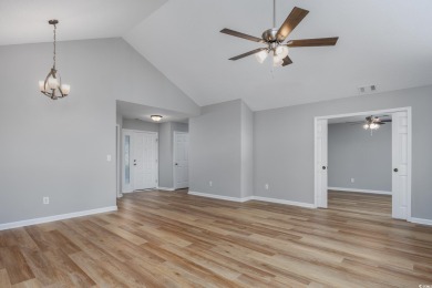 Nestled in the vibrant 55+ community of Myrtle Trace, this on Burning Ridge Golf Course in South Carolina - for sale on GolfHomes.com, golf home, golf lot