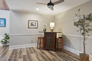 This mid-century modern home has been tastefully updated while on Colonial Country Club Deerfield in Mississippi - for sale on GolfHomes.com, golf home, golf lot