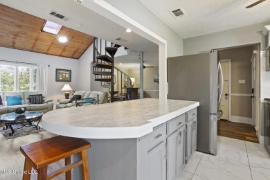 This mid-century modern home has been tastefully updated while on Colonial Country Club Deerfield in Mississippi - for sale on GolfHomes.com, golf home, golf lot