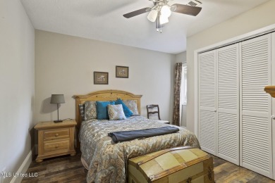 This mid-century modern home has been tastefully updated while on Colonial Country Club Deerfield in Mississippi - for sale on GolfHomes.com, golf home, golf lot