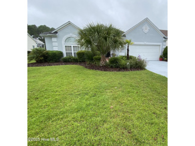 STUNNING HOME WITH WATER & GOLF COURSE VIEWS-YOUR EVERYDAY on Sandpiper Bay Golf and Country Club in North Carolina - for sale on GolfHomes.com, golf home, golf lot