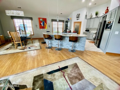 STUNNING HOME WITH WATER & GOLF COURSE VIEWS-YOUR EVERYDAY on Sandpiper Bay Golf and Country Club in North Carolina - for sale on GolfHomes.com, golf home, golf lot