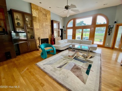 STUNNING HOME WITH WATER & GOLF COURSE VIEWS-YOUR EVERYDAY on Sandpiper Bay Golf and Country Club in North Carolina - for sale on GolfHomes.com, golf home, golf lot