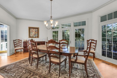 Nestled on a private one-acre homesite, this 3-bedroom, 2.5-bath on Callawassie Island Club in South Carolina - for sale on GolfHomes.com, golf home, golf lot