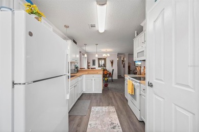 Situated in Port Charlotte Village, a resident-owned 55+ on Kings Gate Golf Club in Florida - for sale on GolfHomes.com, golf home, golf lot