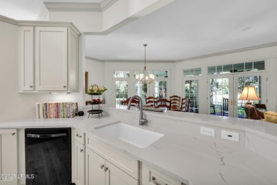Nestled on a private one-acre homesite, this 3-bedroom, 2.5-bath on Callawassie Island Club in South Carolina - for sale on GolfHomes.com, golf home, golf lot