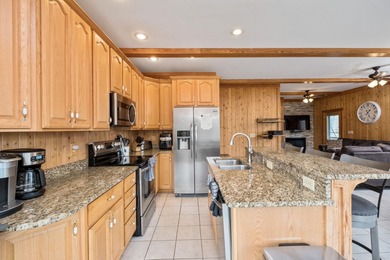 Discover elevated mountain living at 175 Cub Lane, a refined on Woodstone Meadows Golf Course At Massanutten in Virginia - for sale on GolfHomes.com, golf home, golf lot