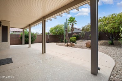 Resort-style living in one of Sun City Grand's most sought-after on Sun City Grand Golf Couse and Club in Arizona - for sale on GolfHomes.com, golf home, golf lot