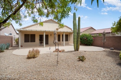 Resort-style living in one of Sun City Grand's most sought-after on Sun City Grand Golf Couse and Club in Arizona - for sale on GolfHomes.com, golf home, golf lot