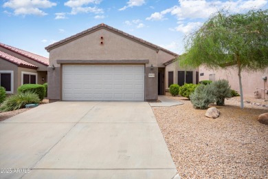 Resort-style living in one of Sun City Grand's most sought-after on Sun City Grand Golf Couse and Club in Arizona - for sale on GolfHomes.com, golf home, golf lot