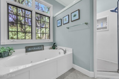 Nestled on a private one-acre homesite, this 3-bedroom, 2.5-bath on Callawassie Island Club in South Carolina - for sale on GolfHomes.com, golf home, golf lot