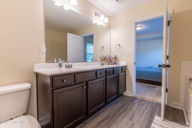 Welcome to this stunning 4 bedroom, 2.5 bath home with an on Rock Creek Country Club in North Carolina - for sale on GolfHomes.com, golf home, golf lot