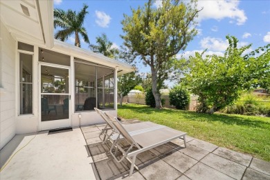Just a golf cart ride to the beach! -- This beautifully updated on Jacaranda West Country Club in Florida - for sale on GolfHomes.com, golf home, golf lot