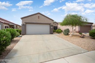 Resort-style living in one of Sun City Grand's most sought-after on Sun City Grand Golf Couse and Club in Arizona - for sale on GolfHomes.com, golf home, golf lot