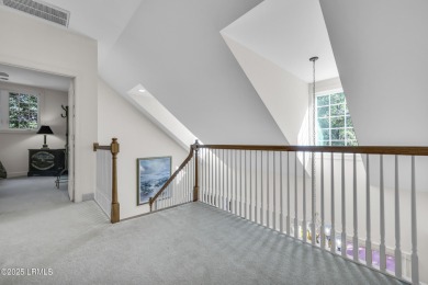 Nestled on a private one-acre homesite, this 3-bedroom, 2.5-bath on Callawassie Island Club in South Carolina - for sale on GolfHomes.com, golf home, golf lot