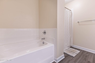 Welcome to this stunning 4 bedroom, 2.5 bath home with an on Rock Creek Country Club in North Carolina - for sale on GolfHomes.com, golf home, golf lot