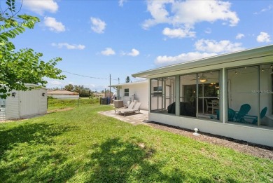 Just a golf cart ride to the beach! -- This beautifully updated on Jacaranda West Country Club in Florida - for sale on GolfHomes.com, golf home, golf lot