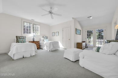 Nestled on a private one-acre homesite, this 3-bedroom, 2.5-bath on Callawassie Island Club in South Carolina - for sale on GolfHomes.com, golf home, golf lot