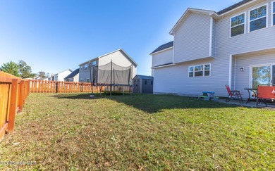 Welcome to this stunning 4 bedroom, 2.5 bath home with an on Rock Creek Country Club in North Carolina - for sale on GolfHomes.com, golf home, golf lot