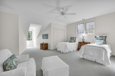 Nestled on a private one-acre homesite, this 3-bedroom, 2.5-bath on Callawassie Island Club in South Carolina - for sale on GolfHomes.com, golf home, golf lot