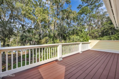 Nestled on a private one-acre homesite, this 3-bedroom, 2.5-bath on Callawassie Island Club in South Carolina - for sale on GolfHomes.com, golf home, golf lot
