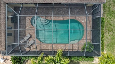 Welcome to this beautifully crafted DM Dean custom-built home on Seminole Lakes Country Club in Florida - for sale on GolfHomes.com, golf home, golf lot