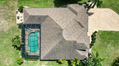 Welcome to this beautifully crafted DM Dean custom-built home on Seminole Lakes Country Club in Florida - for sale on GolfHomes.com, golf home, golf lot