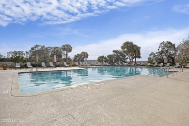 Nestled on a private one-acre homesite, this 3-bedroom, 2.5-bath on Callawassie Island Club in South Carolina - for sale on GolfHomes.com, golf home, golf lot