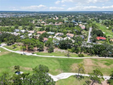 Nestled within the esteemed Calusa Lakes golf course community on Mission Valley Country Club in Florida - for sale on GolfHomes.com, golf home, golf lot