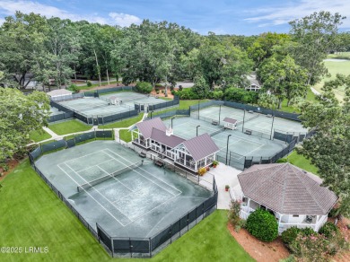 Nestled on a private one-acre homesite, this 3-bedroom, 2.5-bath on Callawassie Island Club in South Carolina - for sale on GolfHomes.com, golf home, golf lot