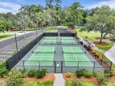 Nestled on a private one-acre homesite, this 3-bedroom, 2.5-bath on Callawassie Island Club in South Carolina - for sale on GolfHomes.com, golf home, golf lot