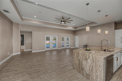 Welcome to *The Crown Jewel of Rotonda Heights* - where elevated on Rotonda Golf and Country Club The Palms Course in Florida - for sale on GolfHomes.com, golf home, golf lot