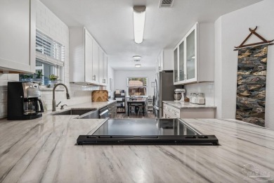 Welcome to this beautifully remodeled home in the highly on Tiger Point Golf and Country Club in Florida - for sale on GolfHomes.com, golf home, golf lot