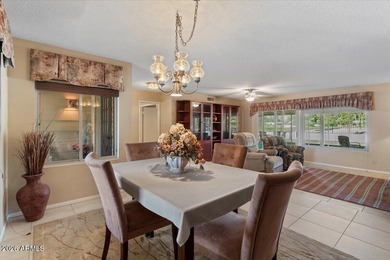 Beautifully situated on the 13th green of the scenic Ahwatukee on Ahwatukee Country Club in Arizona - for sale on GolfHomes.com, golf home, golf lot