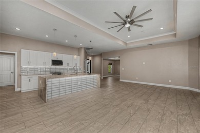 Welcome to *The Crown Jewel of Rotonda Heights* - where elevated on Rotonda Golf and Country Club The Palms Course in Florida - for sale on GolfHomes.com, golf home, golf lot