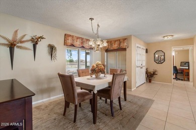 Beautifully situated on the 13th green of the scenic Ahwatukee on Ahwatukee Country Club in Arizona - for sale on GolfHomes.com, golf home, golf lot