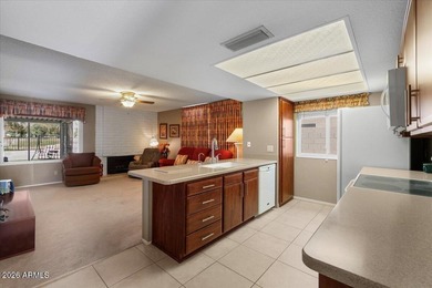 Beautifully situated on the 13th green of the scenic Ahwatukee on Ahwatukee Country Club in Arizona - for sale on GolfHomes.com, golf home, golf lot