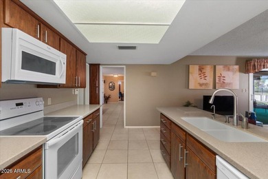 Beautifully situated on the 13th green of the scenic Ahwatukee on Ahwatukee Country Club in Arizona - for sale on GolfHomes.com, golf home, golf lot