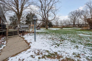 Spacious 3 bedroom ranch home on 1 acre overlooking hole 10 at on Timber Trace Golf Club in Michigan - for sale on GolfHomes.com, golf home, golf lot