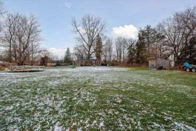 Spacious 3 bedroom ranch home on 1 acre overlooking hole 10 at on Timber Trace Golf Club in Michigan - for sale on GolfHomes.com, golf home, golf lot